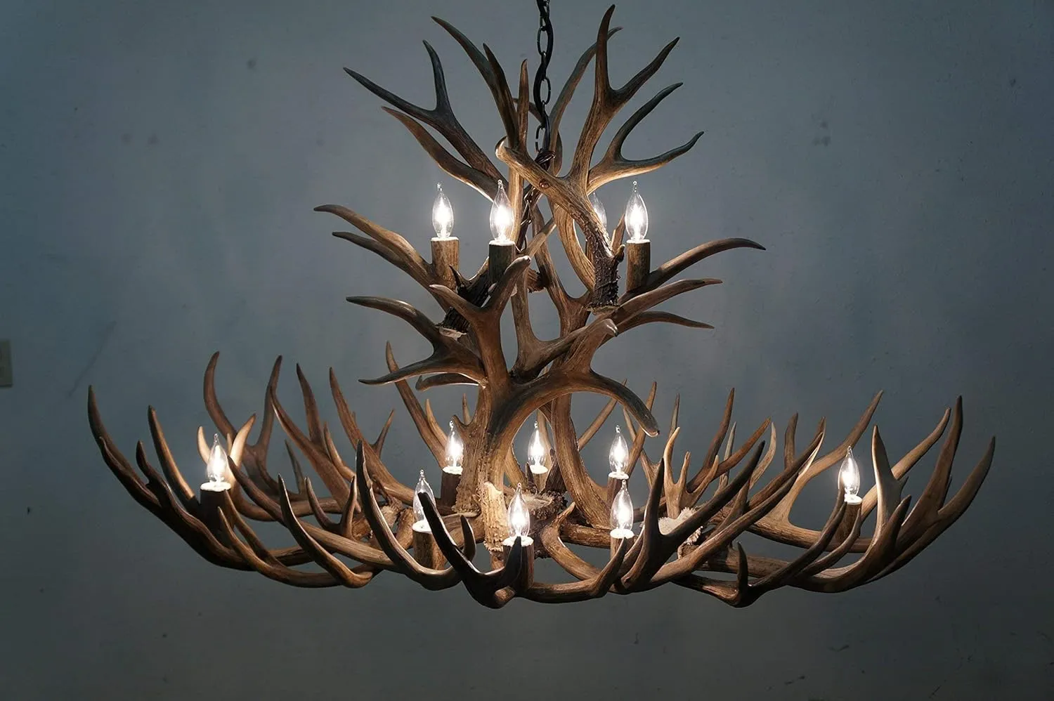 Real antler chandelier shed mule deer oval shape with extra uprights and two tier cascade lighting 12 lights with real elk socket covers